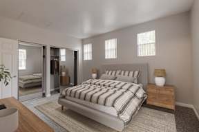A bedroom with a large bed and a mirrored closet.