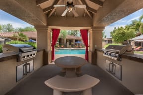Pool with cabana and outdoor grilling setup in mesa arizona at Vista Grove Apartments, Arizona, 85204