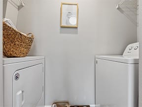 model home laundry room with full size washer/dryer  at Vista Commons Apartments, Columbia, SC, 29201