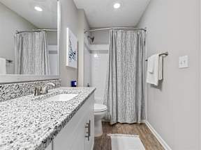master bathroom with granite and shower/tub combo  at Vista Commons Apartments, Columbia, 29201