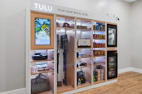 A Tulu smart rental store with various items on display.