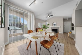 a dining room with a table and chairs and a fireplace