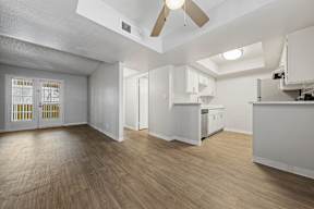 Luxury Apartments for Rent in Tempe - Villatree - Living Room with Wood-Style Flooring, Ceiling Fan, and Open Layout