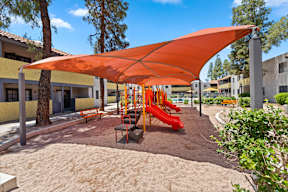 Pet-Friendly Apartments in South Tempe, AZ - Villatree - Playground with Covered Tent, Sand, and Swing Set