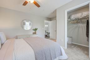 Bedroom with large closet and ceiling fan  at Vista Commons Apartments, Columbia