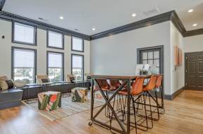 clubhouse lounge area hightop table with stools  at Vista Commons Apartments, Columbia, 29201