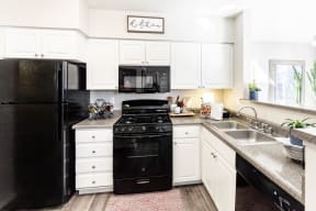 open kitchen white cabinets at Vista Grove Apartments, Arizona