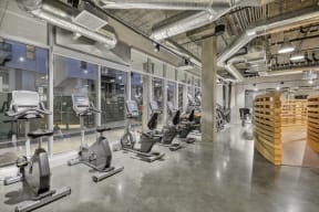 a gym with treadmills and other exercise equipment at L Seven, San Francisco, CA