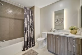 a bathroom with a toilet and a shower and a sink at L Seven, San Francisco, 94103