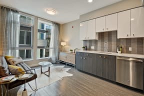 a kitchen and living room in an apartment at L Seven, CA 94103