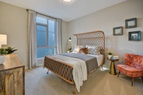 a bedroom with a bed and a window at L Seven, San Francisco, CA