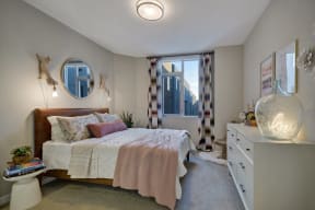 a bedroom with a bed and a window at L Seven, San Francisco, California 94103