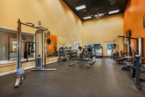 a fitness center with cardio equipment and weights  at Citrine Hills, Ontario, CA, 91761