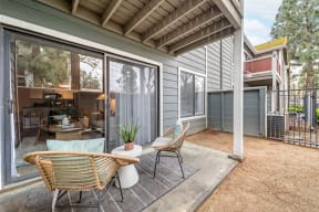 Outdoor patio area with sliding glass door to personal apartment at Citrine Hills, California