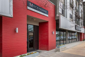 the front of a red building with a door at Mockingbird Flats, Dallas, 75206