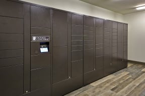 a row of brown lockers in a room with wood floors at Mockingbird Flats, Dallas, TX, 75206