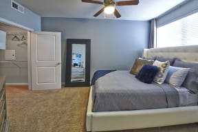 a bedroom with a bed and a ceiling fan at Mockingbird Flats, Texas, 75206