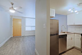 Living room and kitchen at Allora Phoenix Apartments, Phoenix, AZ