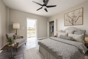 a bedroom with a large bed and a ceiling fan