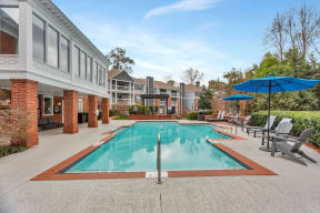 the preserve at ballantyne commons pool and patio with umbrellas at Madison Brookhaven, Atlanta, GA, 30329