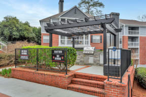 the front of a house with a gate and stairs in front of it at Madison Brookhaven, Georgia, 30329