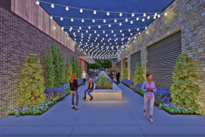 a rendering of a pedestrian walkway with plants and trees under a canopy of lights