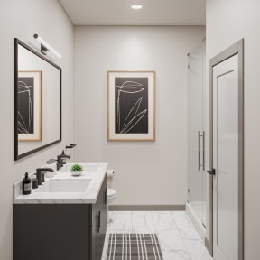 a small bathroom with two sinks and a shower with a glass door at Madison West Elm, Pennsylvania