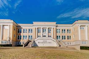A large building with the number 2244 and the name Rivermont Ave on it.