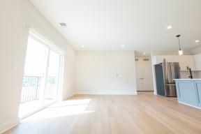 an open kitchen and living room North End Apartments