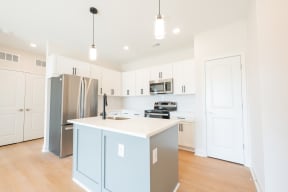 a large kitchen The North End Apartments