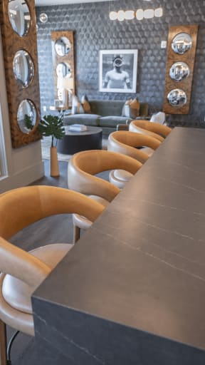 a view of the bar and seating area from behind the counter in a restaurant at The Fitzgerald, Spartanburg, SC