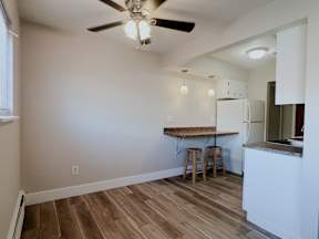 Kitchen With White Cabinetry And Appliances at Emerald Village Apartments, Willoughby, OH, 44094