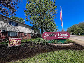 the signs in front of the stony creek apartments