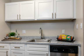 Kitchen with Stainless Steel Sink, Hardware and Appliances