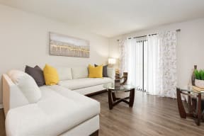 Spacious Living Room with Hardwood Style Flooring