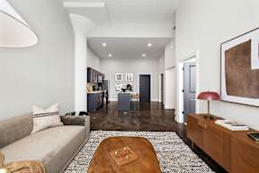 a living room with a couch and a coffee table