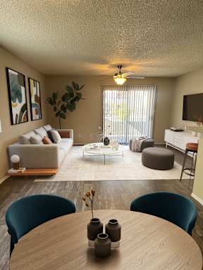 a living room with a couch and a table