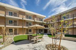 A sunny day at the courtyard of apartment buildings.