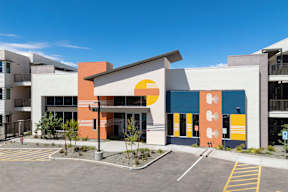 A building with a sun motif on the front.