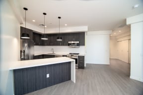 Kitchen and dining area at RendezVous Urban Flats in Tucson AZ