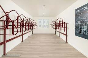 A hallway with a sign that says "find you" on the wall.