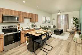 A modern kitchen with a wooden cabinet and a black stove top oven.