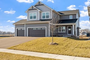 House with 3 car garage and yard