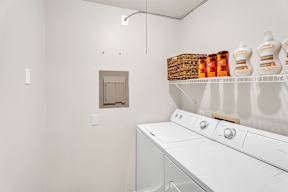 A laundry room with a washer and dryer.