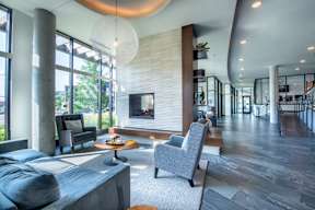 a living room with a fireplace and a couch