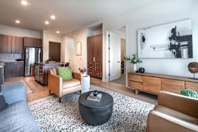 a living room with a couch and a table
