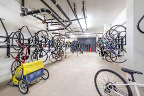 a large room filled with many bikes on the wall