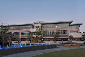 A modern building with the word "Bank" on it.