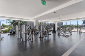 a gym with a view of the city