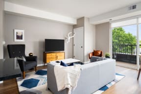 Vintage on Selby | St. Paul, MN |a living room with a couch and a tv